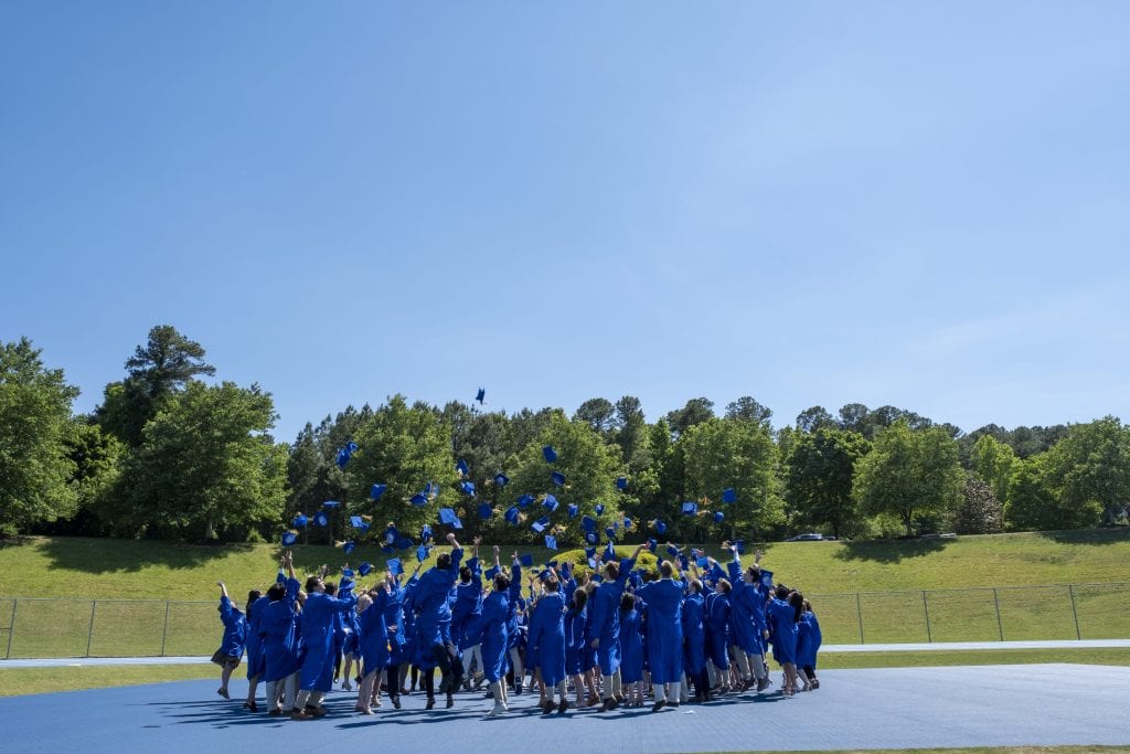 Class of 2021 tosses their caps in the air