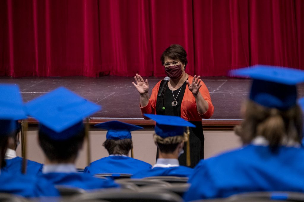 Sandra Gutierrez speaks to the class of 2021 prior to commencement